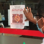 Pengumuman yang menyatakan Perpustakaan Nasional Bung Karno sedang tutup.