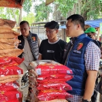 Peninjauan beras yang dilakukan Satgas Pangan Polresta Sidoarjo bersama Dinas Perdagangan di Pasar Larangan.