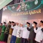 Istighotsah Akbar Harlah NU dan Pergunu di Ponpes Roudlotun Nur Salim, Podokaton, Gondangwetan, Pasuruan, Minggu (27/03/2022).