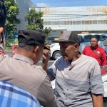 Pihak Polres Malang saat sedang mengamankan situasi di Satpas SIM Singosari, Malang (foto:ist)