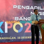 Ketua Pengadilan Tinggi Surabaya, Kresna Menon, saat memberi sambutan dalam PN Bangkalan Expo 2022. Foto: AHMAD FAUZI/BANGSAONLINE