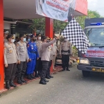 Kapolres Bangkalan AKBP Alith Alarino melepas bantuan paket sembako untuk musibah korban erupsi Gunung Semeru di Lumajang.