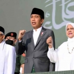 Presiden Jokowi saat menghadiri resepsi puncak Satu Abad NU di Stadion Gelora Delta, Sidoarjo.