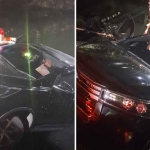 Petugas saat mengevakuasi mobil yang tercebut di kali depan RS Ubaya.
