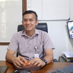 Kepala Kantor Cabang BPJS Ketenagakerjaan Kabupaten Tuban, Achmad Fatahuddin saat ditemui di ruang kerjanya, Jumat (16/9/2022).