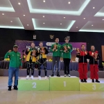 Atlet Cabor Dance Sport Bangkalan, Egidius Erens, dan Octovilo Hugo Vallen Idanawang, saat menerima medali di Porprov Jatim 2023.