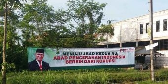 Resepsi Puncak Satu Abad NU, Spanduk Pesan Antikorupsi Bergambar Firli Bahuri Hiasi Sidoarjo