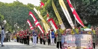 Peringati HJT ke 730, Satpol PP Tuban Sosialisasikan Gerakan Gempur Rokok Ilegal di Acara Drumband