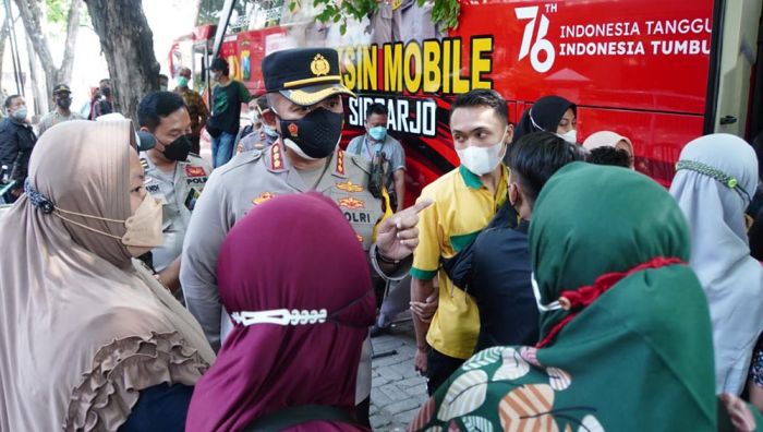 Polresta Sidoarjo Masifkan Vaksinasi di Pasar Tradisional