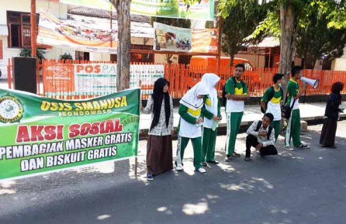 Hujan Abu Vulkanik Belum Berhenti, Siswa SMA NU Bondowoso Bagikan Masker dan Biskuit Hujan Abu Vulkanik Belum Berhenti, Siswa SMA NU Bondowoso Bagikan Masker dan Biskuit