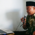 Syafiuddin saat teleconference dengan mitra kerja Komisi V.