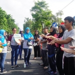 Sosialisasi Perilaku Hidup Bersih Sehat (PHBS) dan Cuci Tangan Pakai Sabun (CTPS) yang digelar Dinkes Surabaya saat car free day.