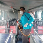 Penyemprotan disinfektan di bus jurusan Bangkalan-Jakarta di terminal Bangkalan