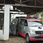 Jenazah Wondo saat sampai di rumah duka usai dilakukan swab test antigen di RSUD Ngudi Waluyo Wlingi.