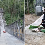 Kondisi pilar badan jembatan yang melengkung dan satu korban tengah menunggu untuk dievakuasi.