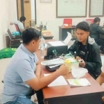 Sekjen Presma UIM saat melapor ke polisi.