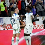 Bukayo Saka mencetak gol ketiga Inggris saat mengalahkan Senegal pada 16 besar Piala Dunia 2022.