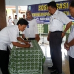 Penandatanganan Berita Acara dukungan dan persetujuan bergabung di Kecamatan Kota Lama.