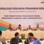  Laporan Kepala Dinas Penanaman Modal, PTSP, Koperasi, dan Usaha Mikro Harum Kusumawati saat sosialisasi Perka BKPM Nomor 13.