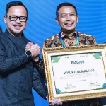 Wali Kota Malang saat menerima penghargaan di IWWEF 2025.