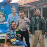 Vian salah satu Anggota Kamseltibcar Satlantas Polres Pasuruan saat berada di pangkalan ojol 