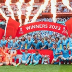Pemain City merayakan gelar juara Piala FA usai mengalahkan Manchester United di Wembley