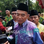 Mendikbud Muhadjir Effendy usai peletakan batu pertama pembangunan SMK Bahrul Ulum, Tambakberas, Kabupaten Jombang, Sabtu (24/12). foto: RONY S/ BANGSAONLINE