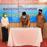 Wali Kota Pasuruan Saifullah Yusuf saat menandatangani MoU dengan BPJS Kesehatan Cabang Pasuruan.