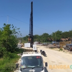 Suasana pengerjaan mega proyek Jalan Lingkar Selatan di Sampang. Foto: MUTAMMIM/BANGSAONLINE