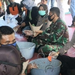 Posko Dapur Umum dan Apel Gabungan Tim Distribusi di GOR A. Yani Pangligur Sumenep.