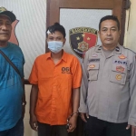 Pelaku curanmor saat diapit petugas dari Polsek Semampir.