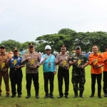 PLN Nusantara Power Unit Pembangkit Gresik bersama perwakilan Polri, Basarnas dan instansi pemerintah saat apel Bulan K3 Nasional 2026. Foto: Ist