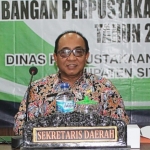 Sekda Syaifullah saat memberikan arahan tentang perpustakaan desa.