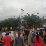 Suasana Upacara 17 Agustus yang digelar Warga Kampung Kanalan Lateng, Banyuwangi.