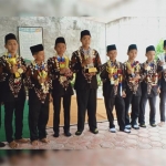 12 Santri Pondok Pesantren Mambaus Sholihin Desa Sumber, Kecamatan Sanankulon, Kabupaten Blitar yang meraih juara umum lomba robotik World Robotic For Peace di Malaysia.