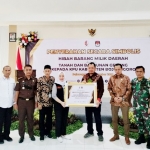 KPU Bojonegoro menerima hibah tanah dan bangunan gedung dari Pemkab Bojonegoro. foto: istimewa