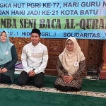 Uswatun Hasanah, guru dari Miftahul Ulum dengan peserta nomor 5 berhasil meraih juara 1 lomba MTQ PGRI Kota Batu 2022.