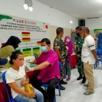 Suasana saat giat vaksinasi Covid-19 di Balai RW 10 Tenggumung Baru Selatan, Kelurahan Pegirian, Kecamatan Semampir, Surabaya.
