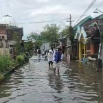 Banjir yang merendam permukiman warga di Desa Kedungringin, Kecamatan Beji, Kabupaten Pasuruan.