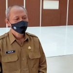 Kepala Dinas PUPR (Pekerjaan Umum dan Penataan Ruang) Kabupaten Trenggalek Ramelan. (foto: HERMAN/ BANGSAONLINE)