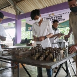 Sidang tera dan tera ulang timbangan terhadap Pedagang Pasar Kota Kediri. foto: ist.