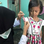 Febrina Putri Maulida (7), bobot tubuhnya hanya 10 Kg dan tinggi badan 102 Cm.