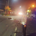 Lokasi kecelakaan yang melibatkan dua sepeda motor dengan sebuah truk.