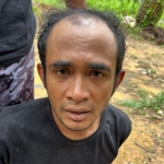 Ahmad Midhol, pembunuh istri pengusaha Gresik saat ditangkap di hutan sawit di Kotawaringin Timur.