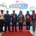 Pj. Wali Kota Kediri Zanariah (lima dari kiri) saat menghadiri upacara Pembukaan Pornikes Internasional. Foto: Ist.