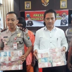 Polisi saat merilis tersangka dan sekaligus BB.