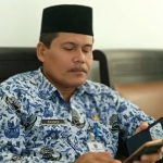 Asisten Administrasi Pemerintahan dan Kesra Sekkab Pacitan, KH Mahmud. foto: YUNIARDI SUTONDO/ BANGSAONLINE