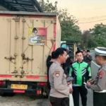 Anggota Satlantas Polres Pamekasan saat melakukan olah TKP