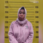 Anna Fardiana (40), Ratu Tipu Minyak Goreng yang bawa kabur uang sebanyak Rp142,5 juta.