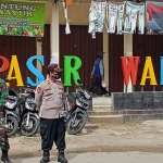 Operasi yustisi protokol kesehatan di depan Pasar Walikukun Ngawi, Senin (4/1/2021). (foto: ist)